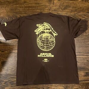 Oversized Above.Millions Tee